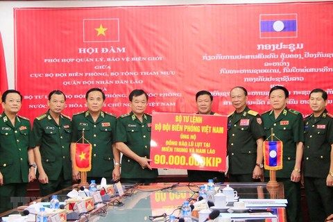 Việt Nam-Lào nhất trí đẩy mạnh hợp tác giữ gìn an ninh, biên giới
